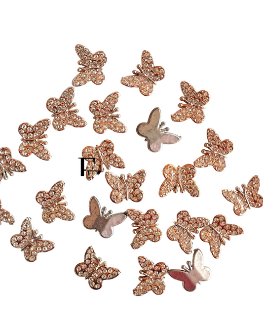 Butterfly-shaped decorative items with rhinestones